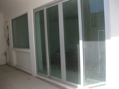 vidrio verde 1/4 con perfil color natural 